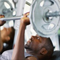 Men exercising in gym 
